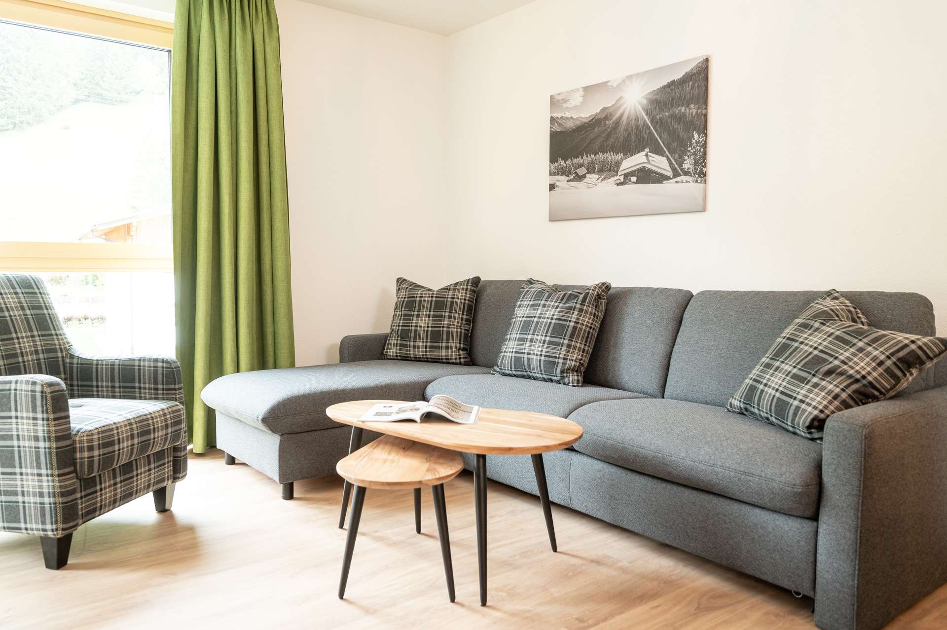 Wildbachlodge Appartementtyp Mini Family Couch mit Sessel Klaus Bauer Photomotion